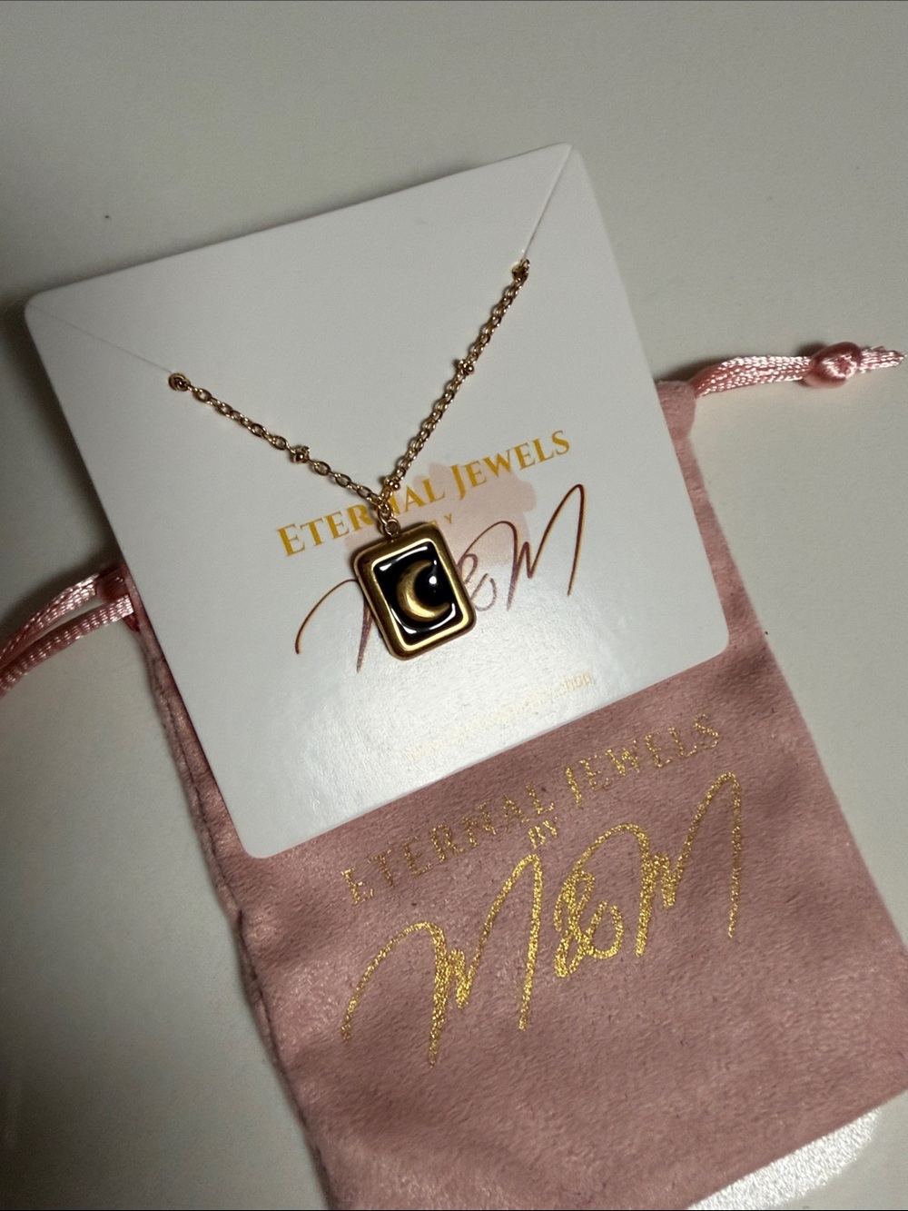 Gold-Tone Crescent Moon Pendant Necklace in Black